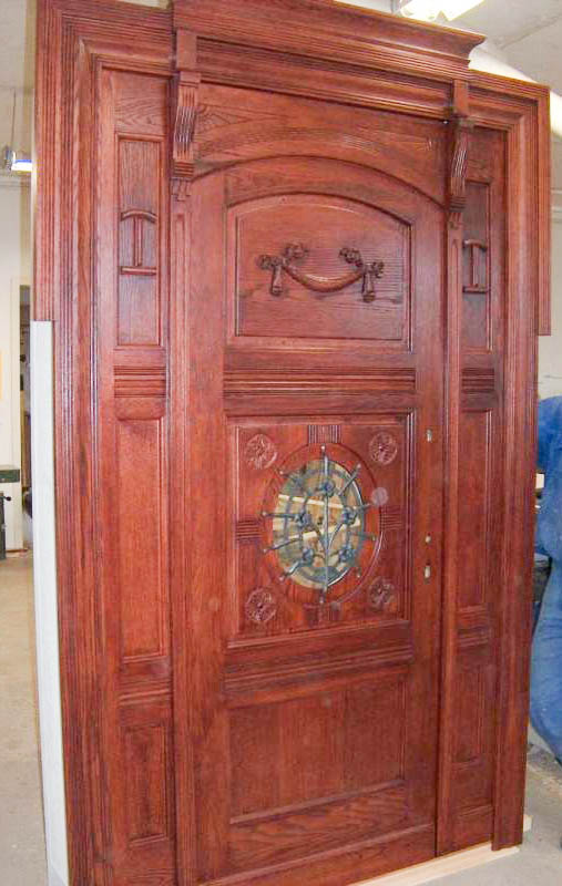 drzwi wejściowe dębowe z płaskorzeźbami
